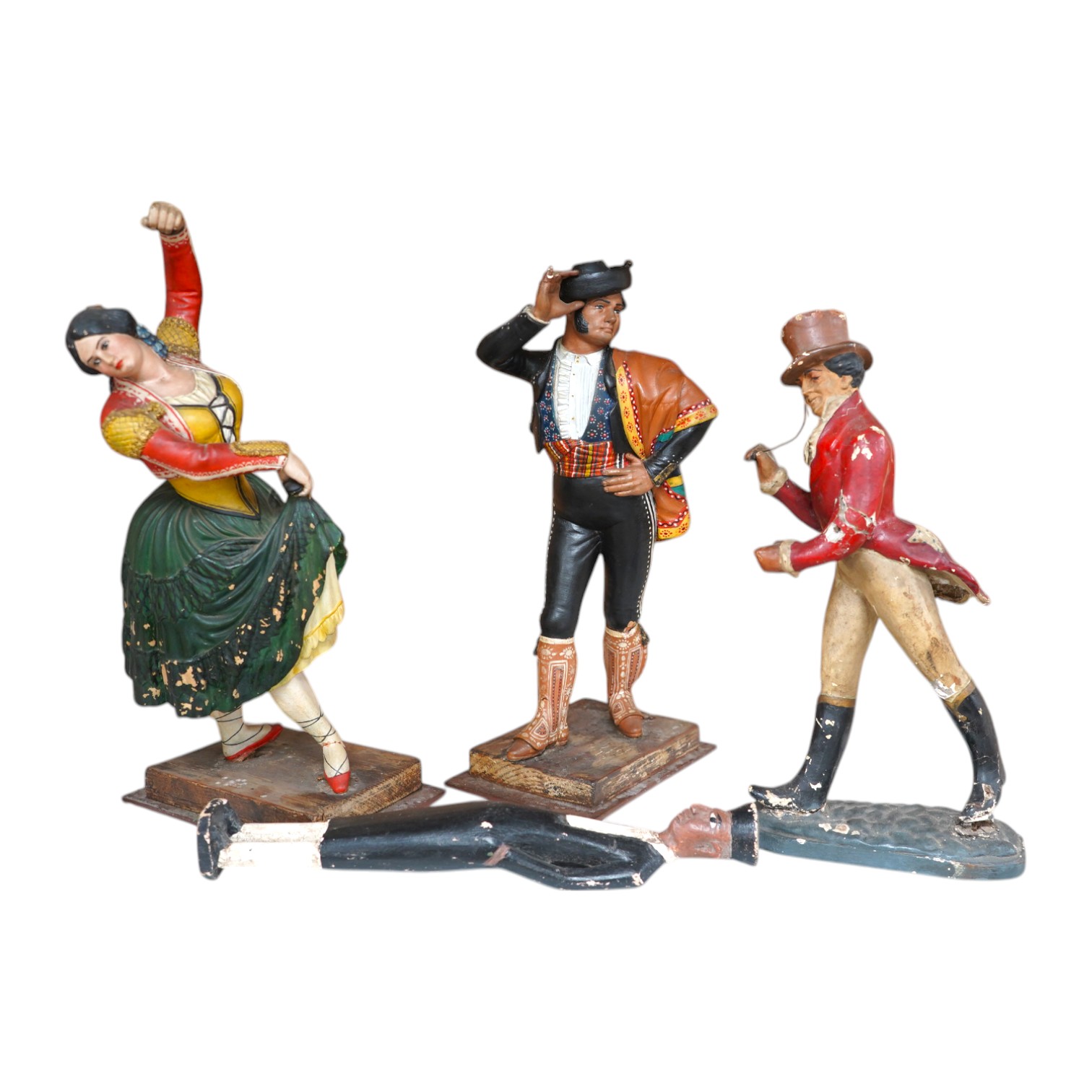 A Johnnie Walker advertising figure, two models of Spanish dancers and an Indian figural carving, tallest 30cm. Condition - poor